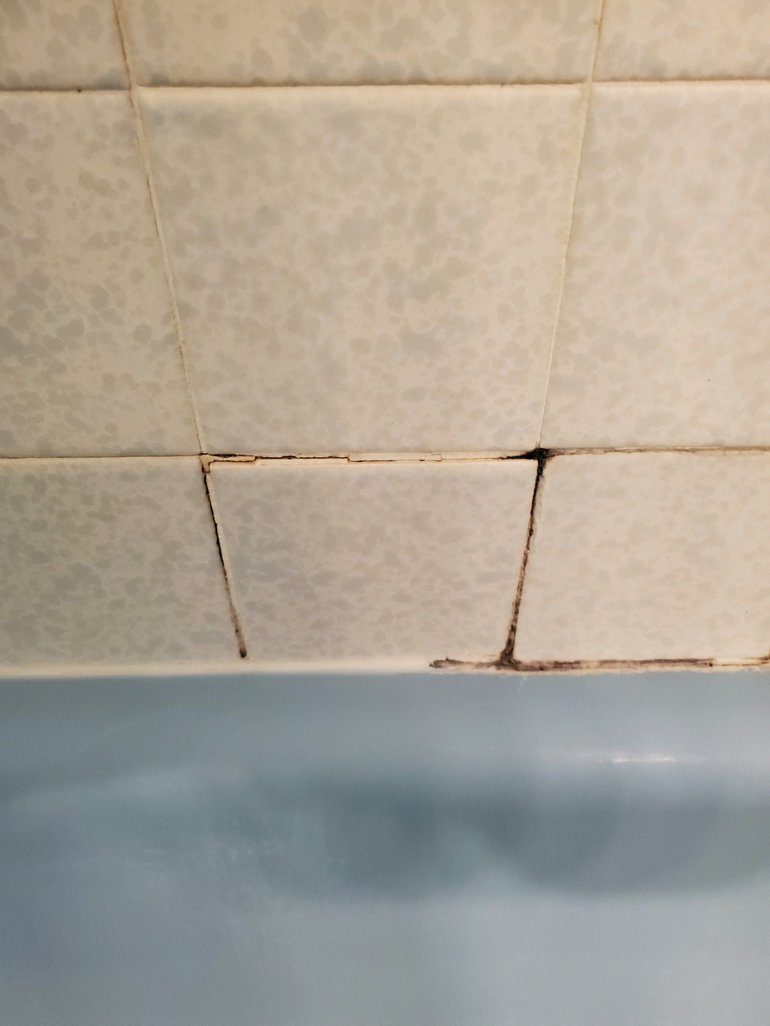 failing grout in shower