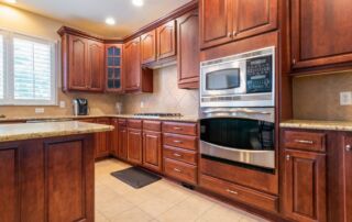 Close-up of clean tile floor with sealed grout lines in a home kitchen